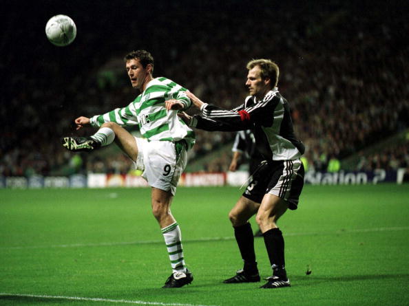 10 Oct 2001:  Chris Sutton of Celtic holds off Erik Hoftun of Rosenborg during the Glasgow Celtic v Rosenborg UEFA Champions League Group E match a...