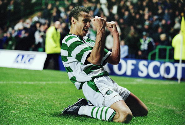 6 Dec 2001:  Henrik Larsson of Celtic celebrates scoring during the UEFA Cup third round second leg match against Valencia played at Celtic Park, i...