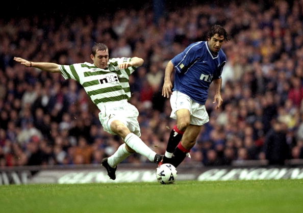 7 Nov 1999:  Gabriel Amato of Rangers is challenged by Alan Stubbs of Celtic in the Scottish Premier League match at Ibrox in Glasgow, Scotland. Ra...