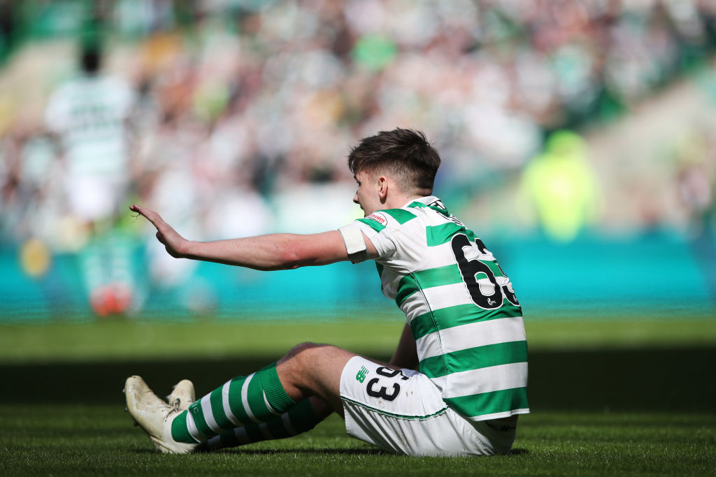Kieran Tierney limps off premateurely as Celtic win title