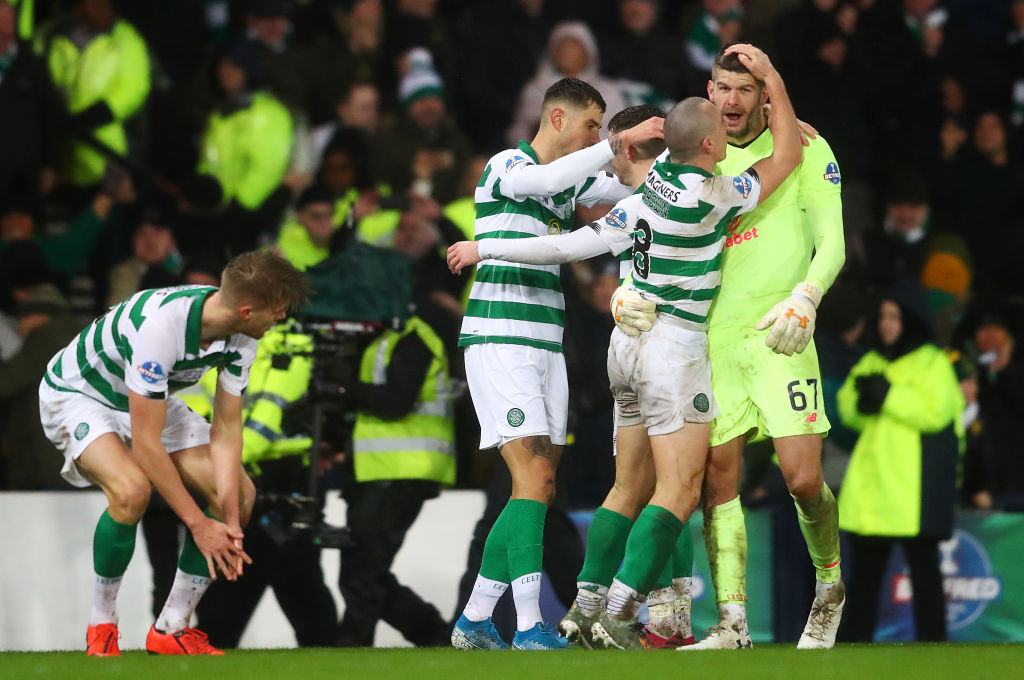 Fraser Forster celebrates a Celtic win over Rangers