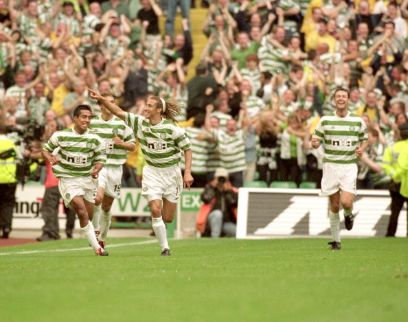 27 Aug 2000:  Henrik Larsson of Celtic celebrates during the Scottish Premier League match against Rangers at Celtic Park in Glasgow, Scotland. Cel...