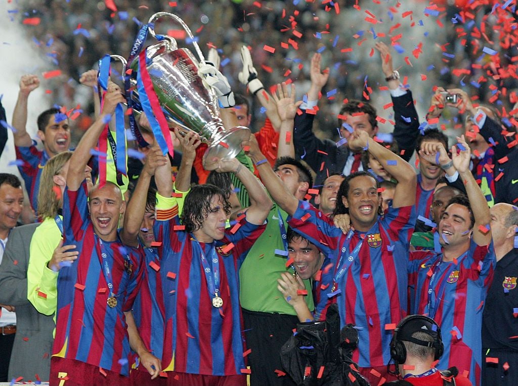 Henrik Larsson with the Champions League trophy