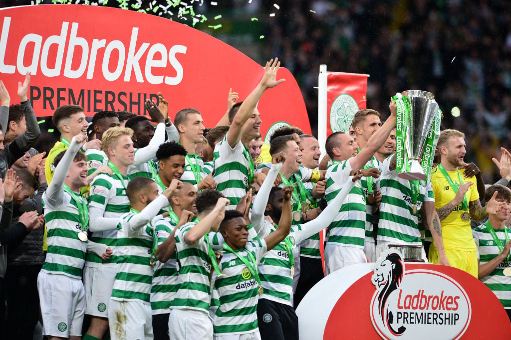 Celtic celebrate winning a league title