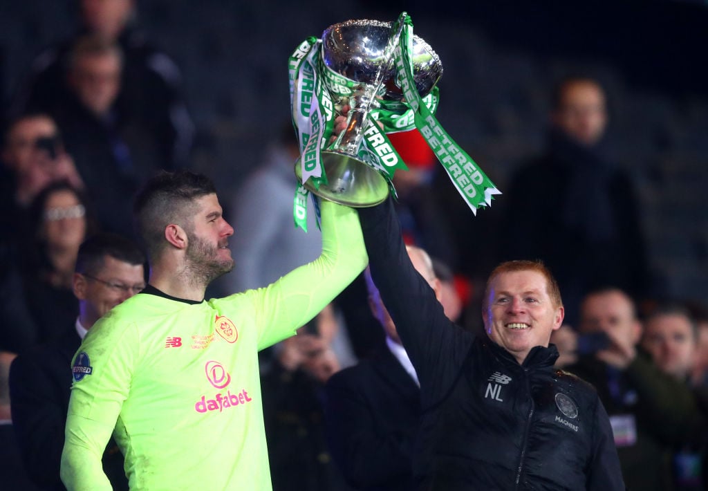 Fraser Forster celebrates a Celtic trophy win