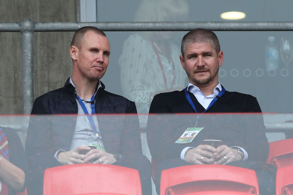 Miller and Robinson sit together