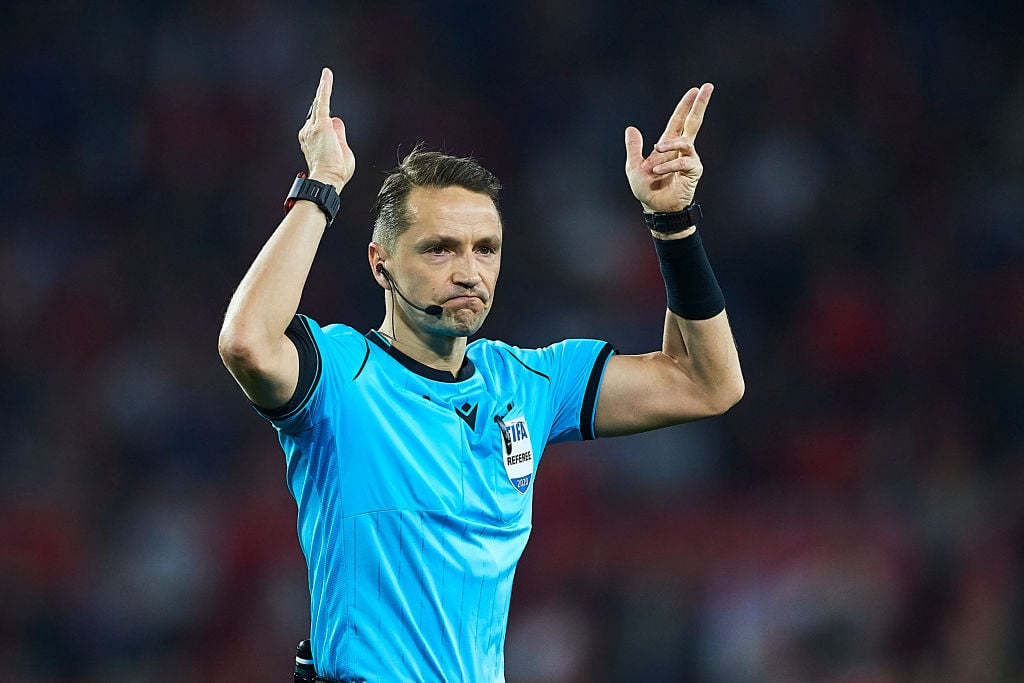 Referee Andris Treimanis had a big call to make