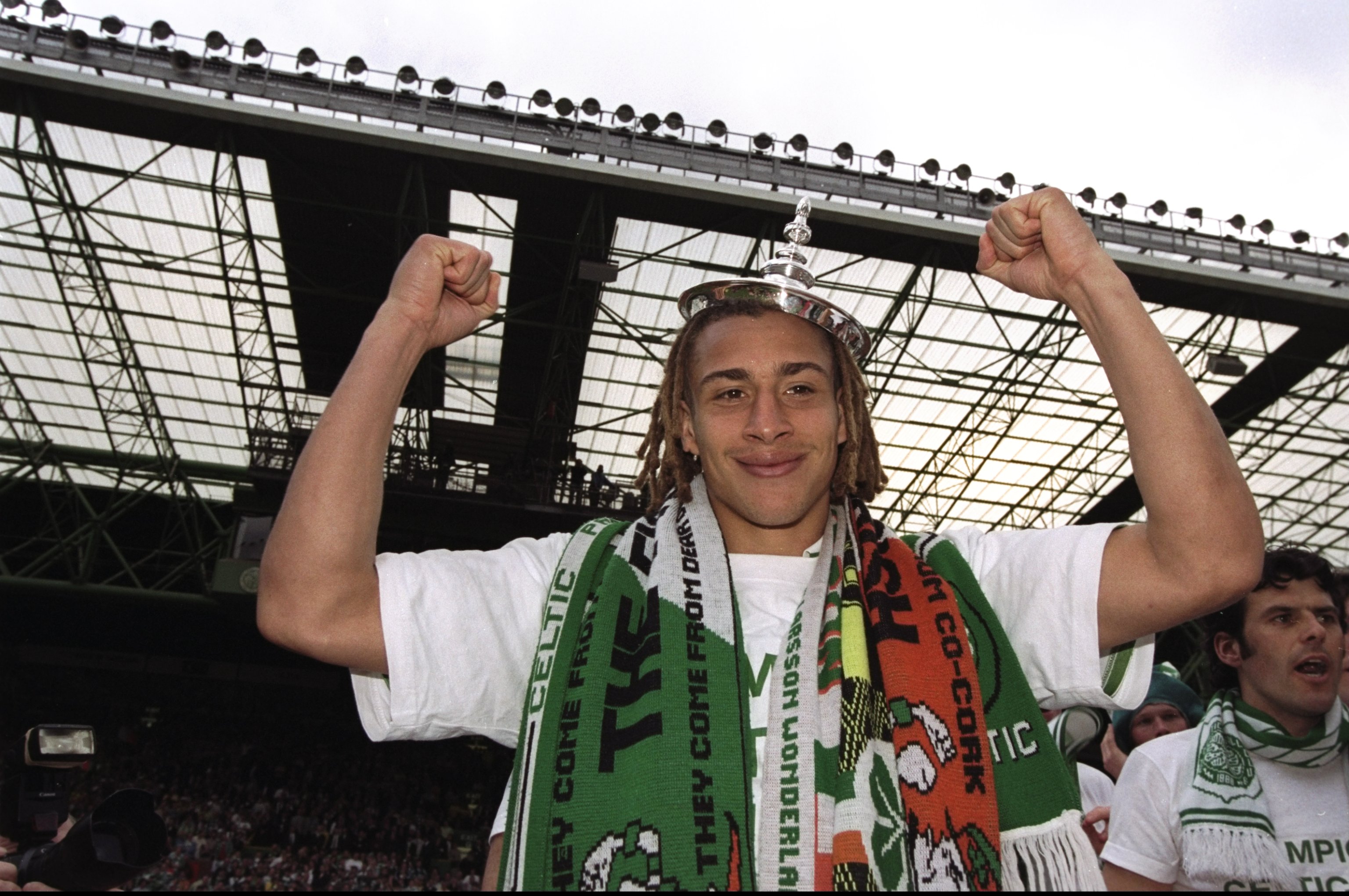 9 May 1998:  Henrik Larsson of Celtic celebrates after a Scottish Premier League match against St Johnstone at Celtic Park in Glasgow, Scotland. Ce...