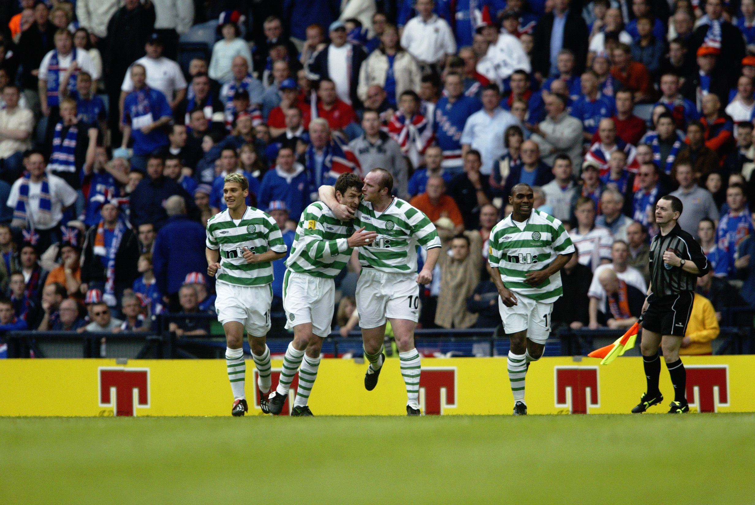 Celtic celebrate against Rangers in 2002