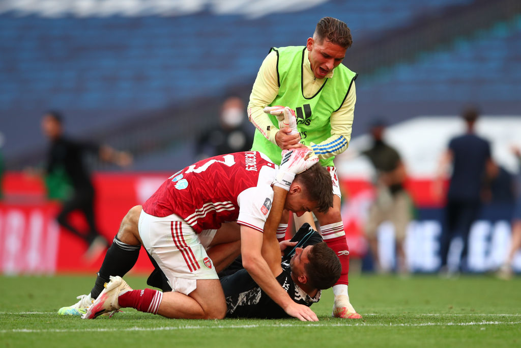 Tierney and Martinez celebrate together