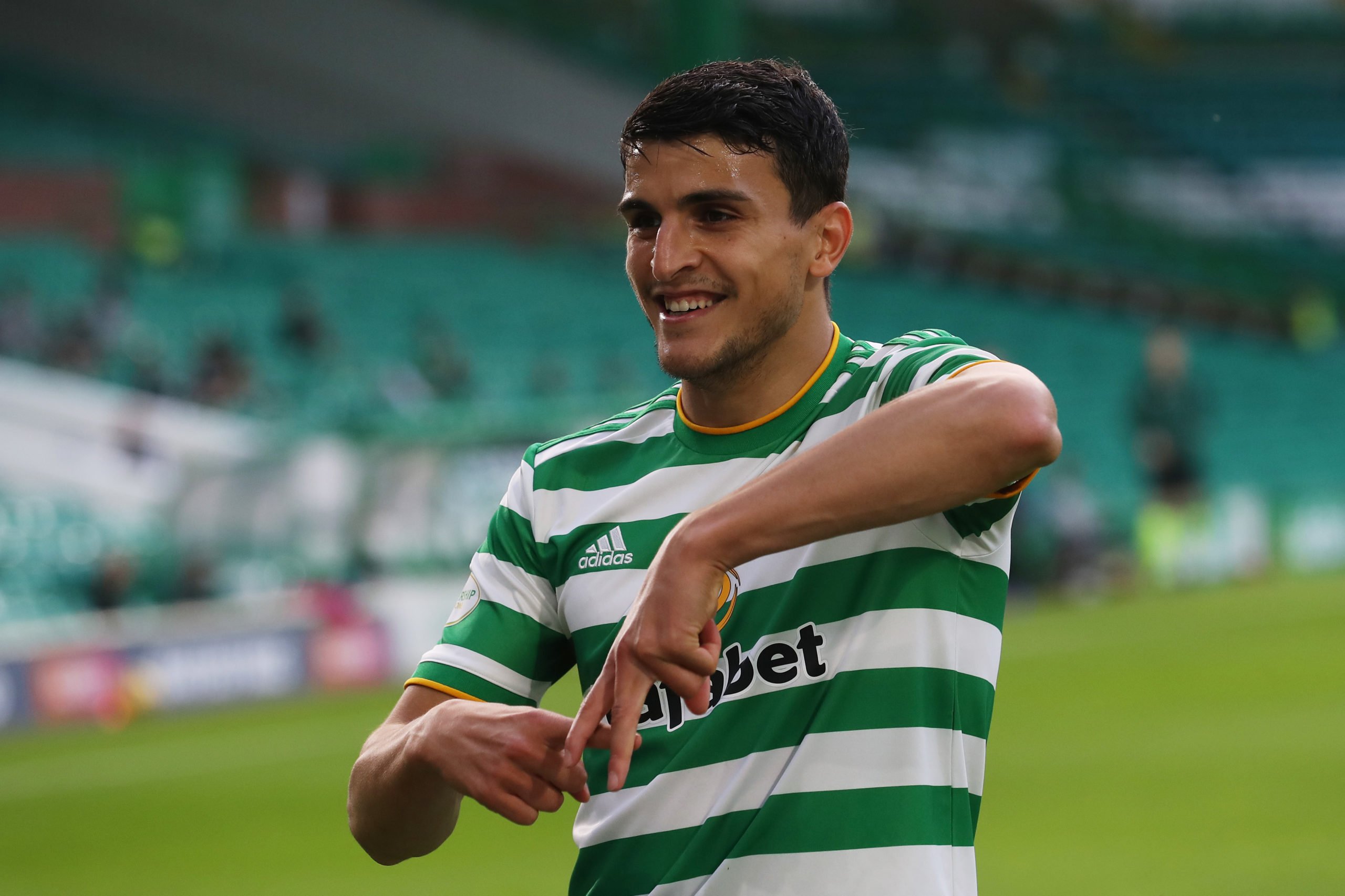 Mohamed Elyounoussi celebrates scoring for Celtic