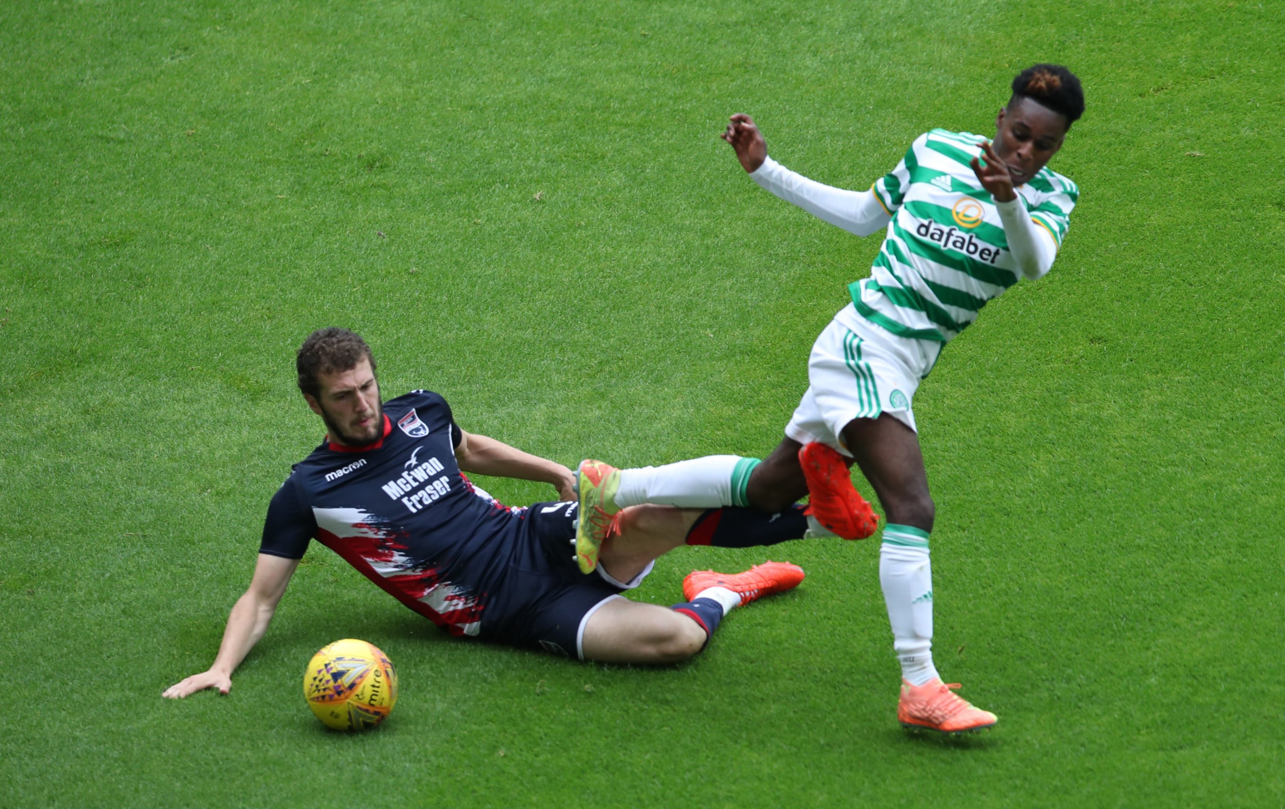 Celtic star Jeremie Frimpong is tackled