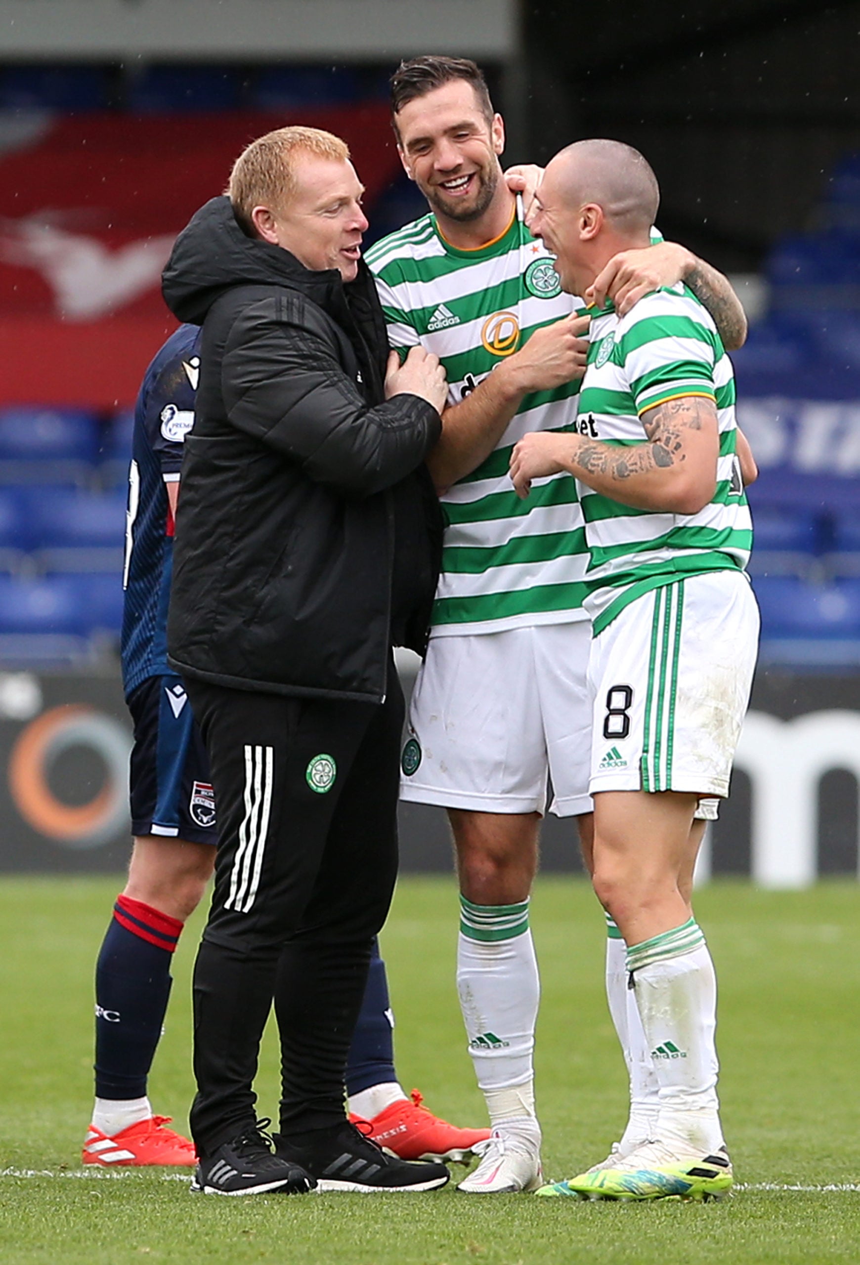 Scott Brown, Neil Lennon and Shane Duffy celebrate after Celtic beat Ross County