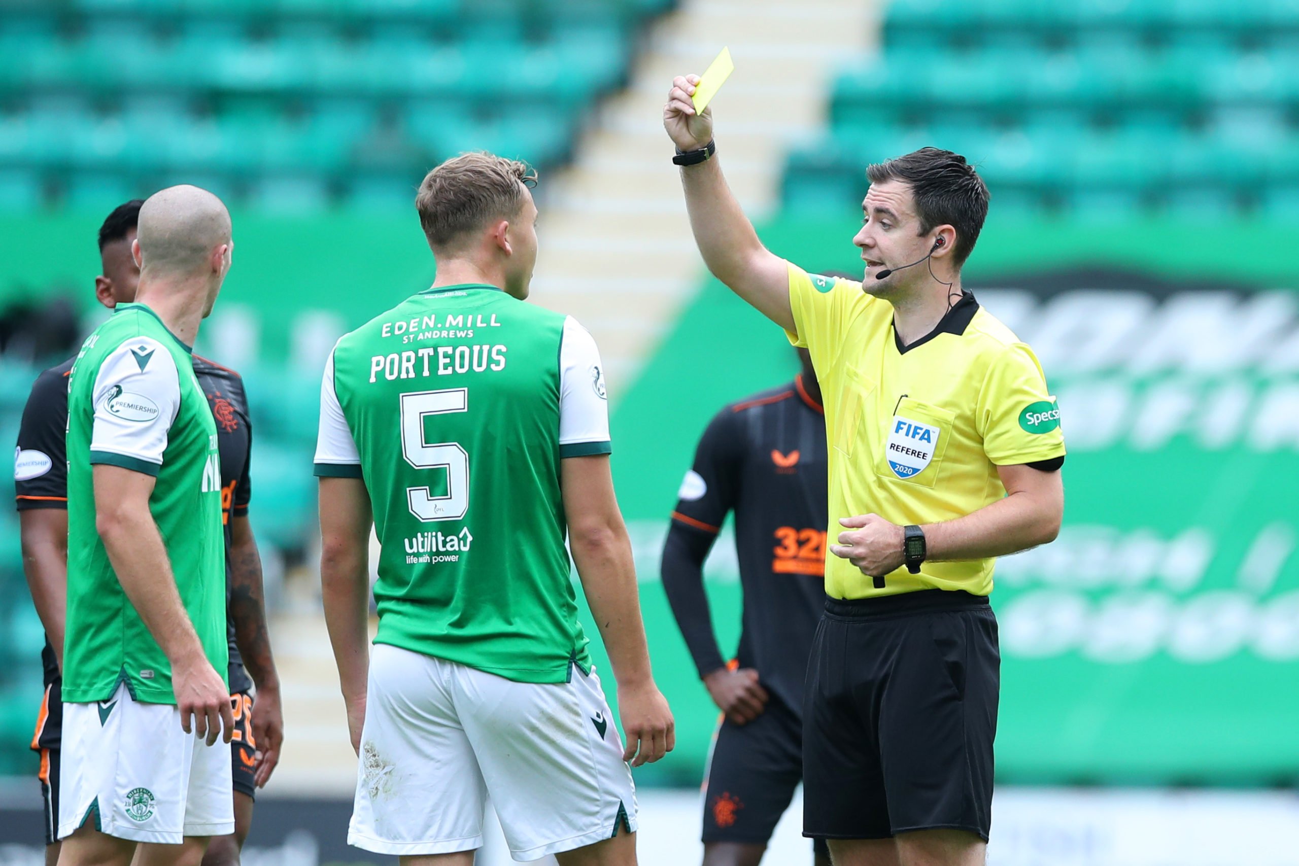 Ryan Porteous is booked against Rangers