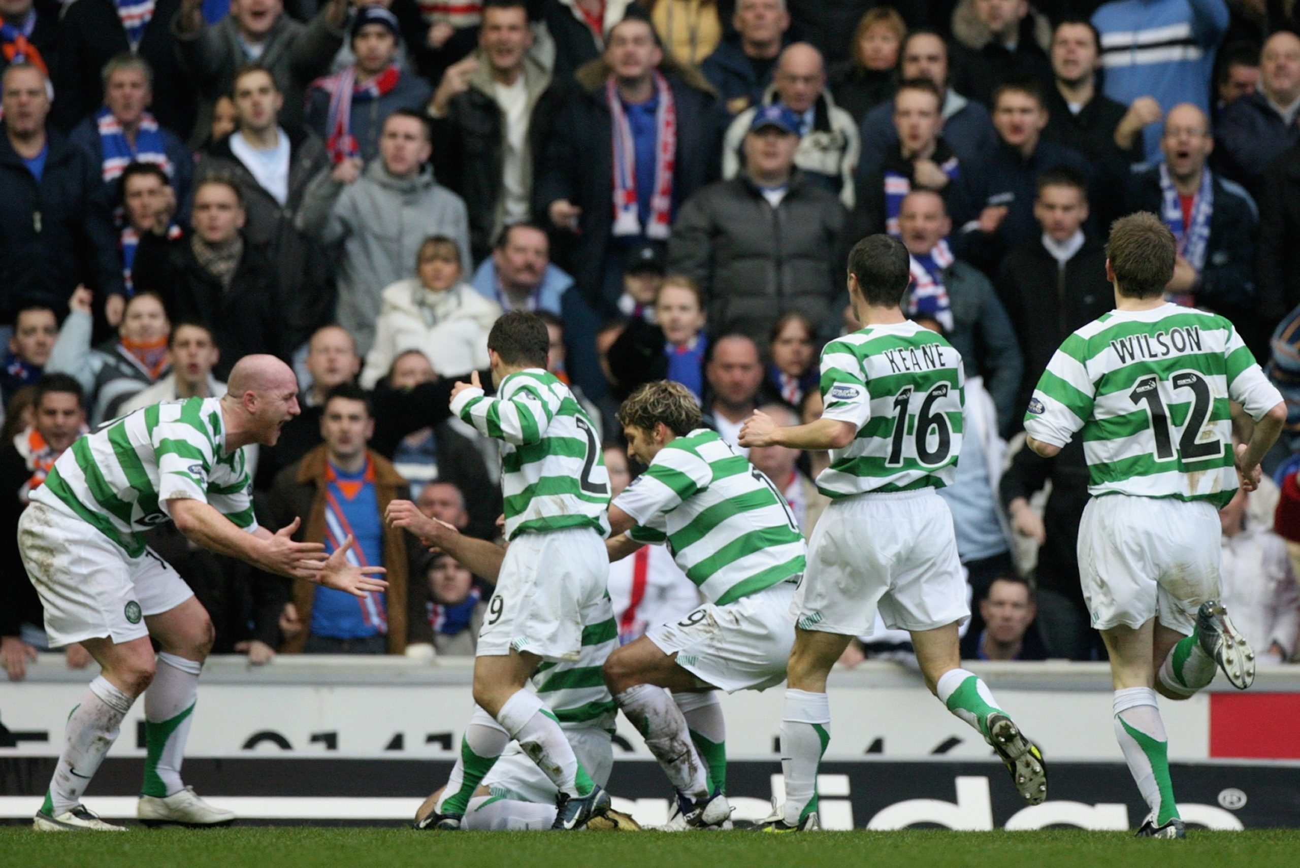 Celtic celebrate Zurawski's goal at Ibrox