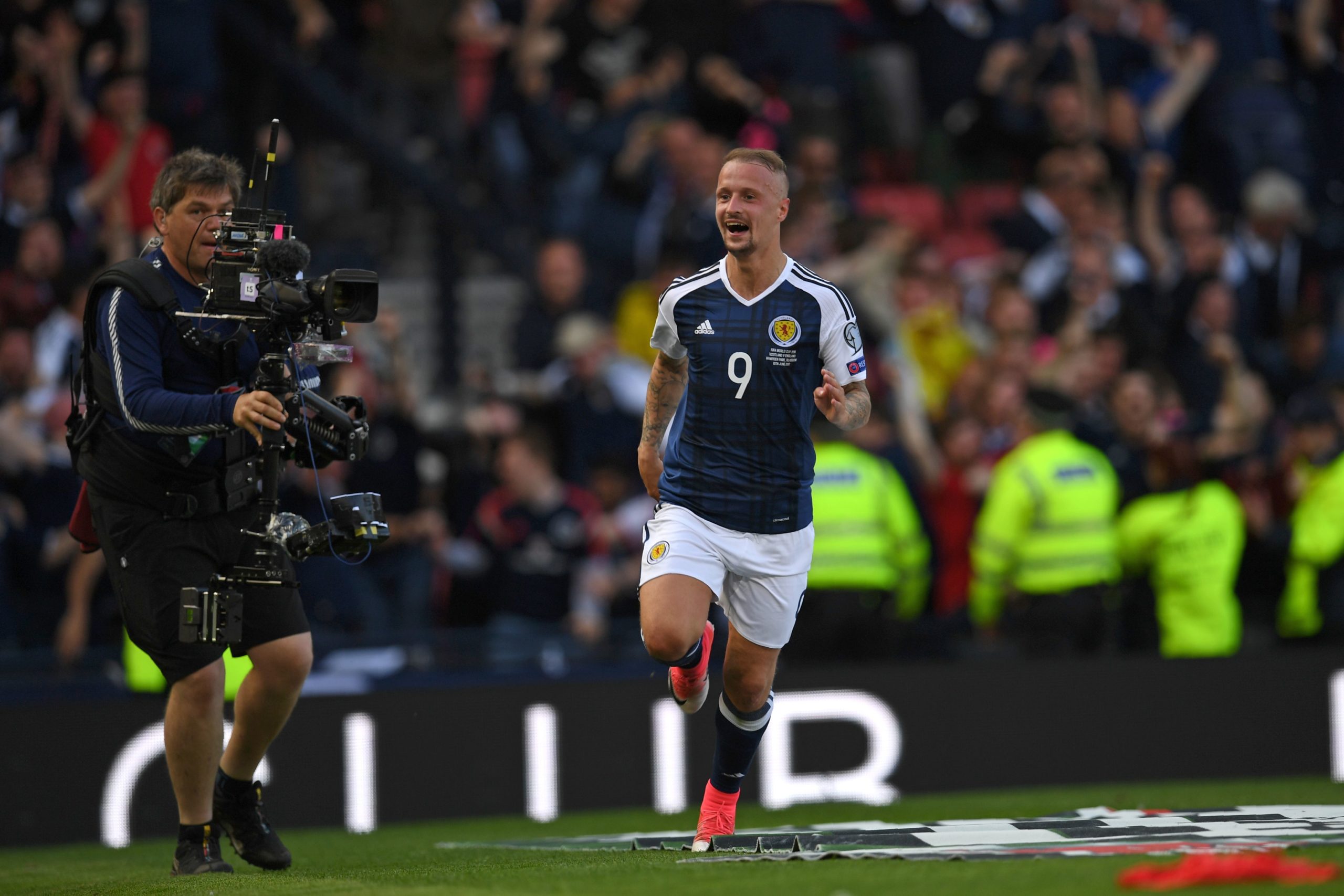 Leigh Griffiths celebrates a memorable goal vs England