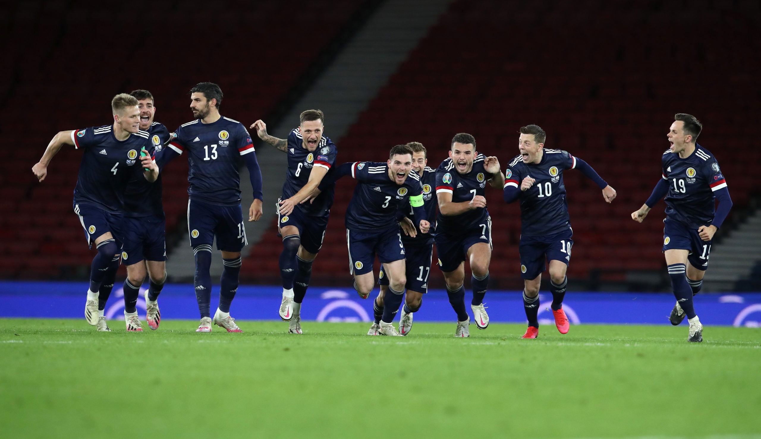 Callum McGregor and his Scotland teammates celebrate the win over Israel