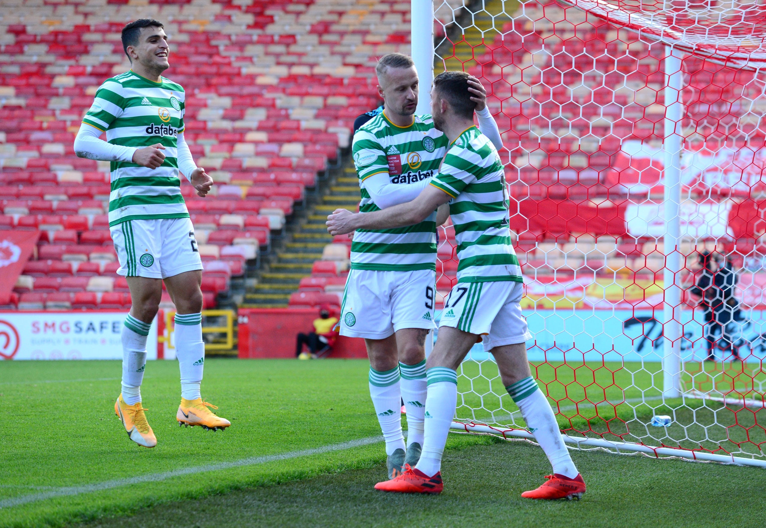 Leigh Griffiths celebrates with Ryan Christie