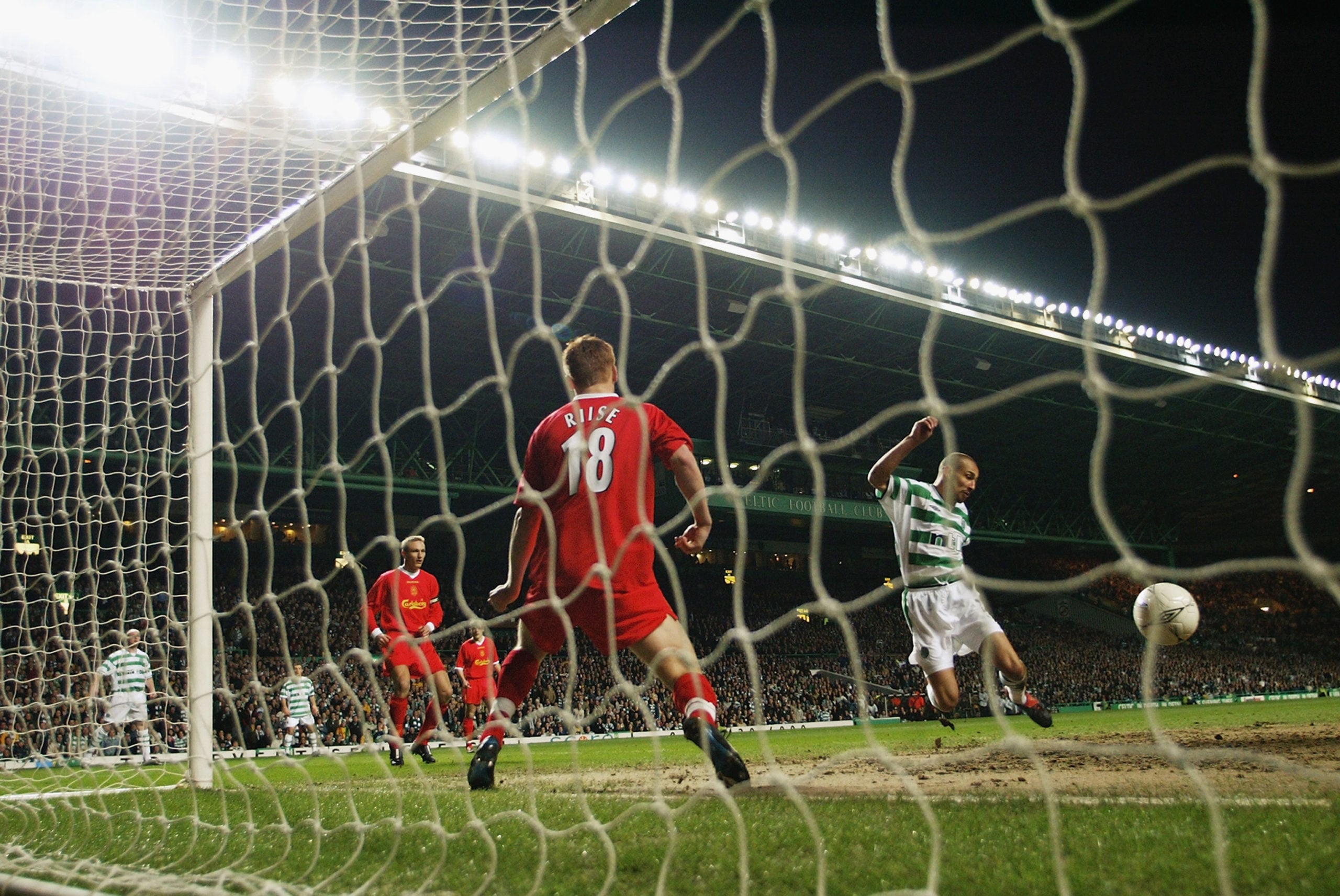 Henrik Larsson scores for Celtic against Liverpool