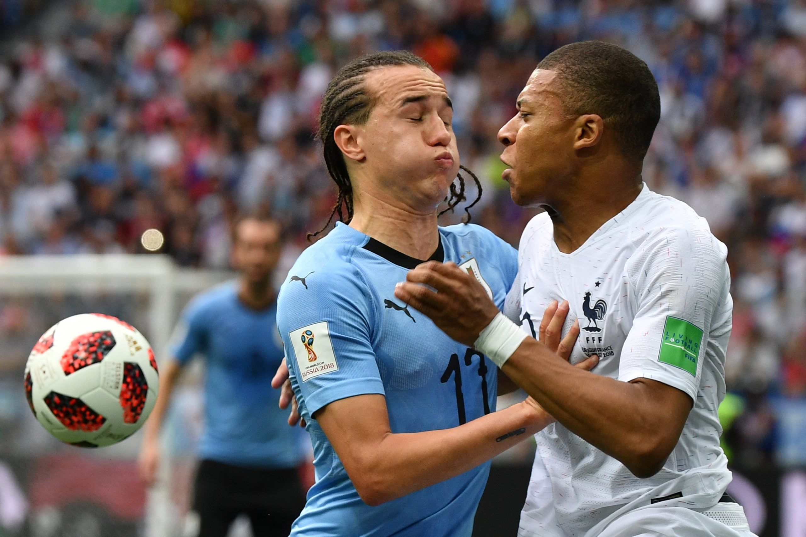 Laxalt vies with France's Kylian Mbappe in 2018