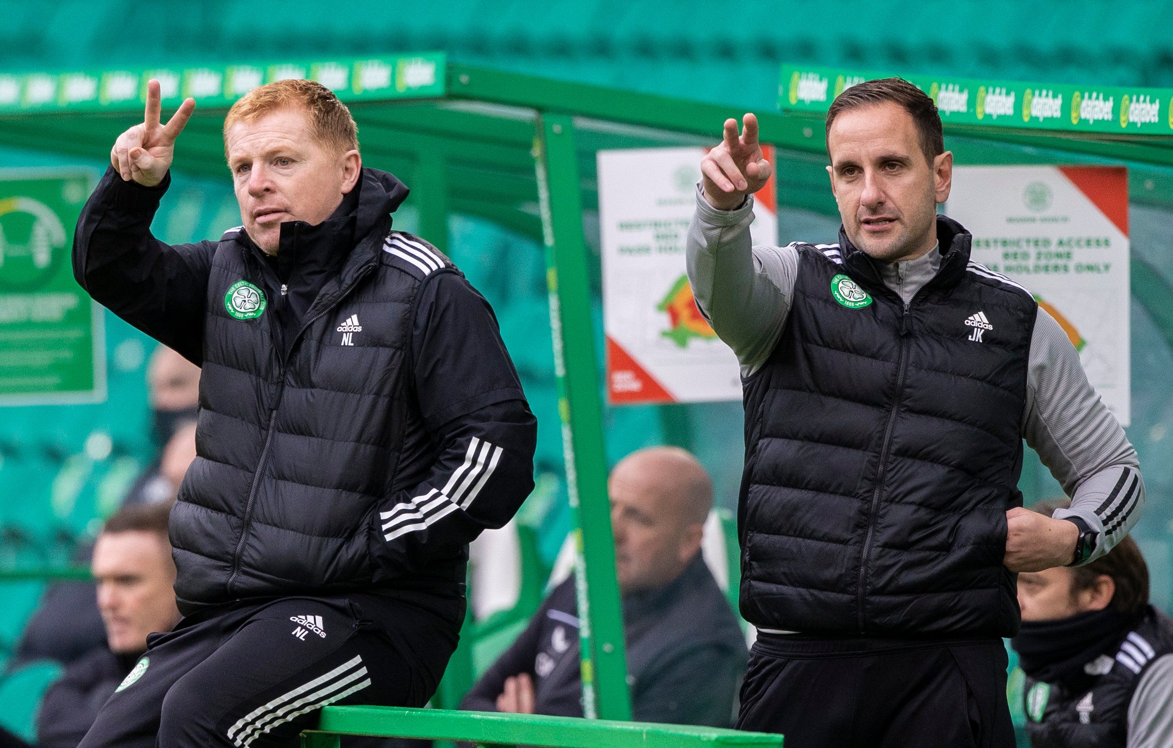 Neil Lennon and John Kennedy in the Celtic dugout