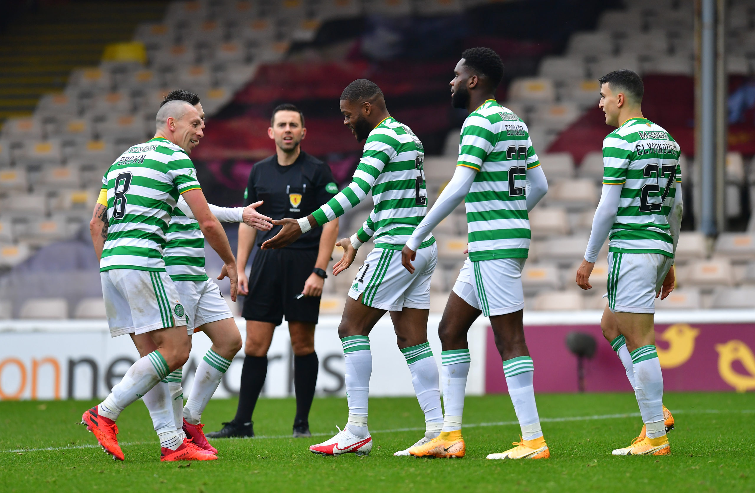Celtic players celebrate at Motherwell
