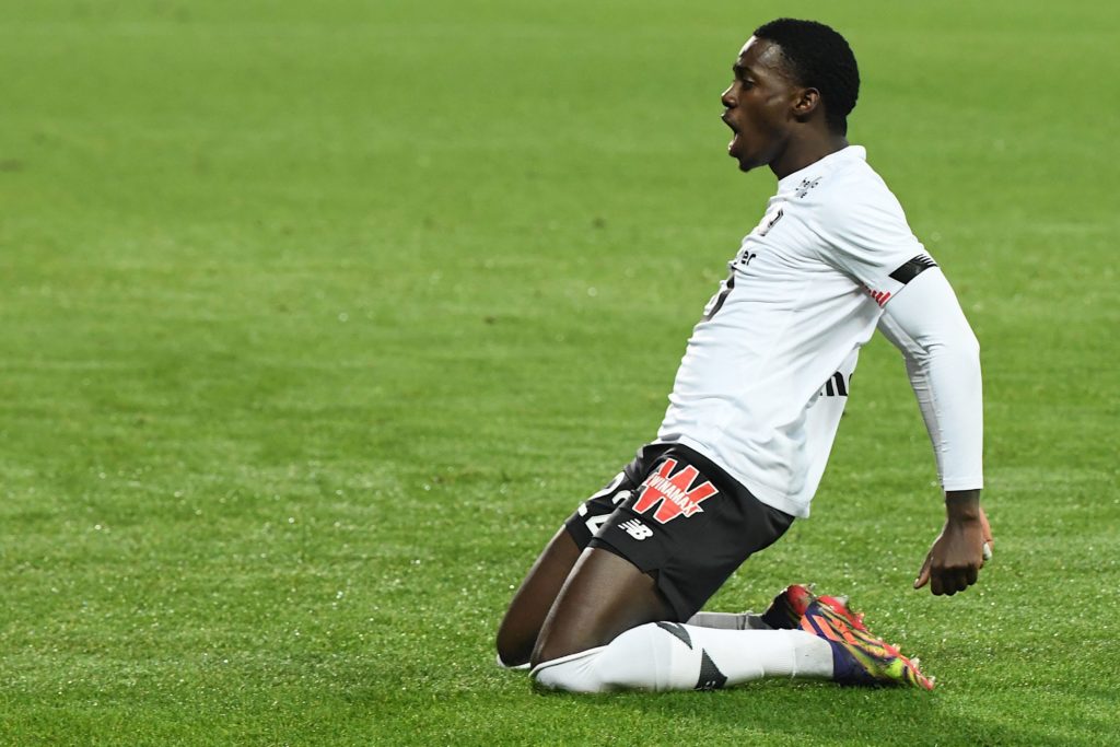 Celtic supporting Weah celebrates his first league goal for Lille