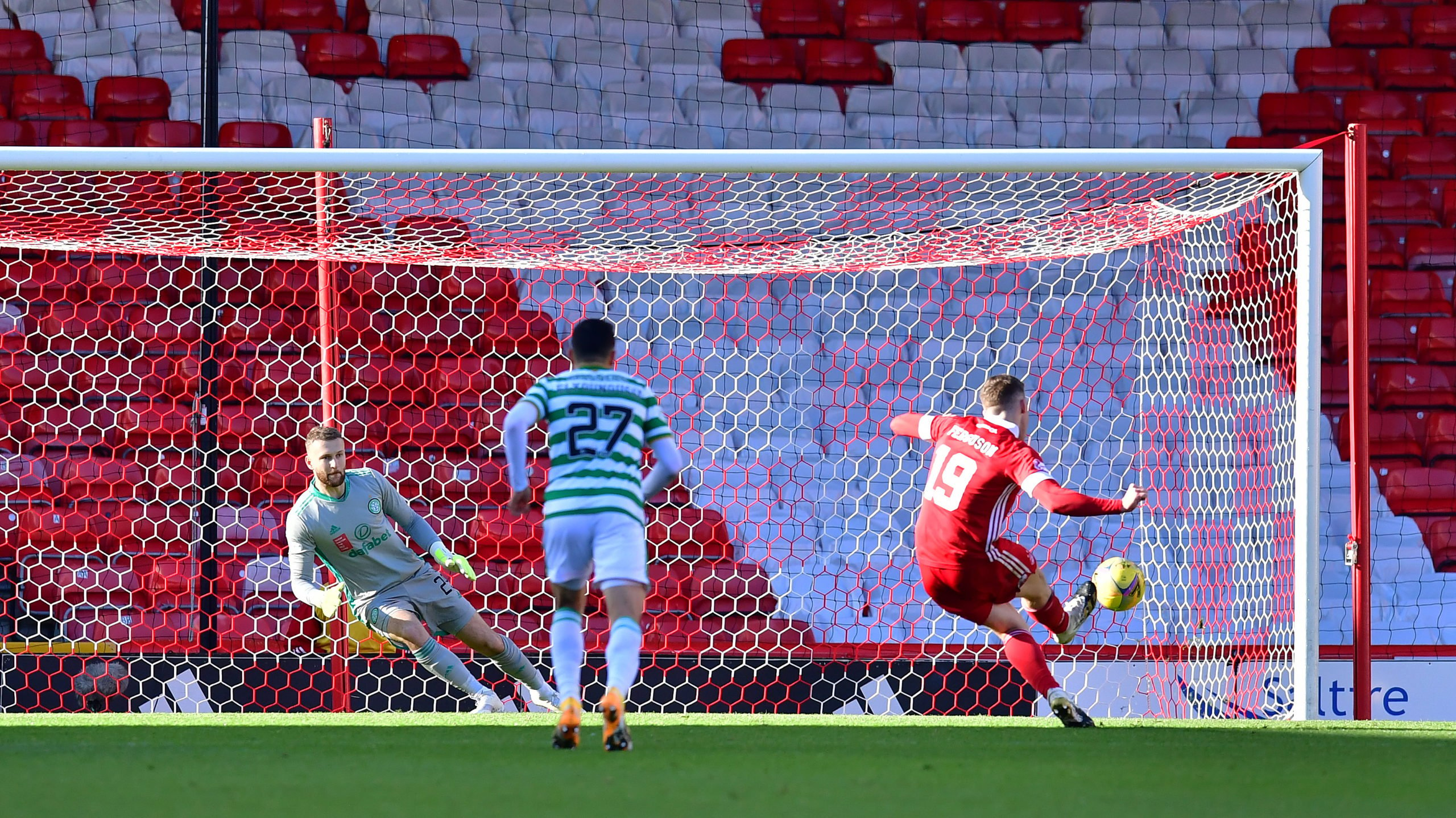Lewis Ferguson scores a penalty for Aberdeen against Celtic