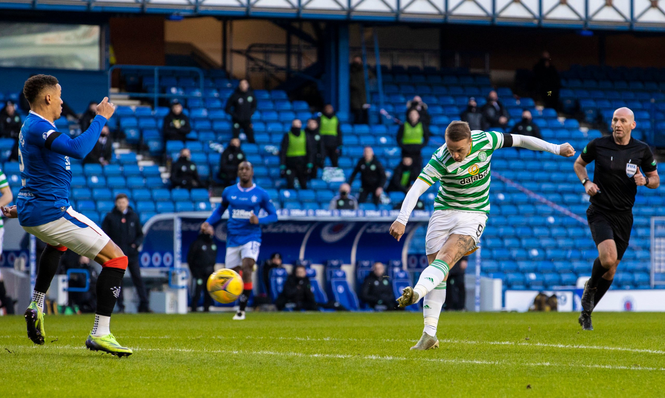 Leigh Griffiths shoots for Celtic at Ibrox