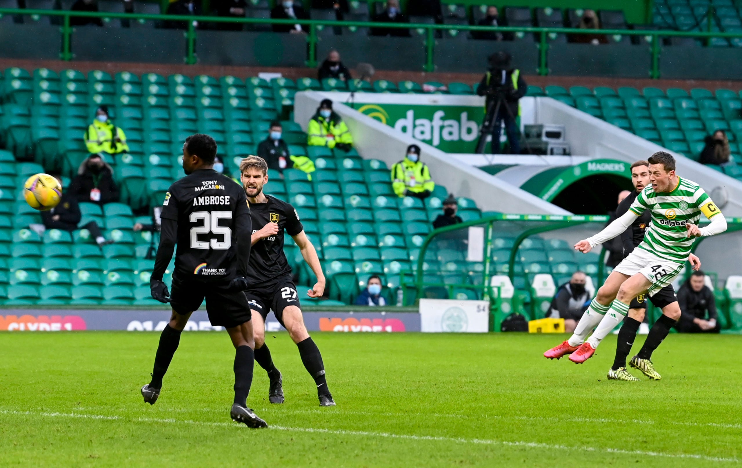 Celtic midfielder Callum McGregor shoots against Livingston