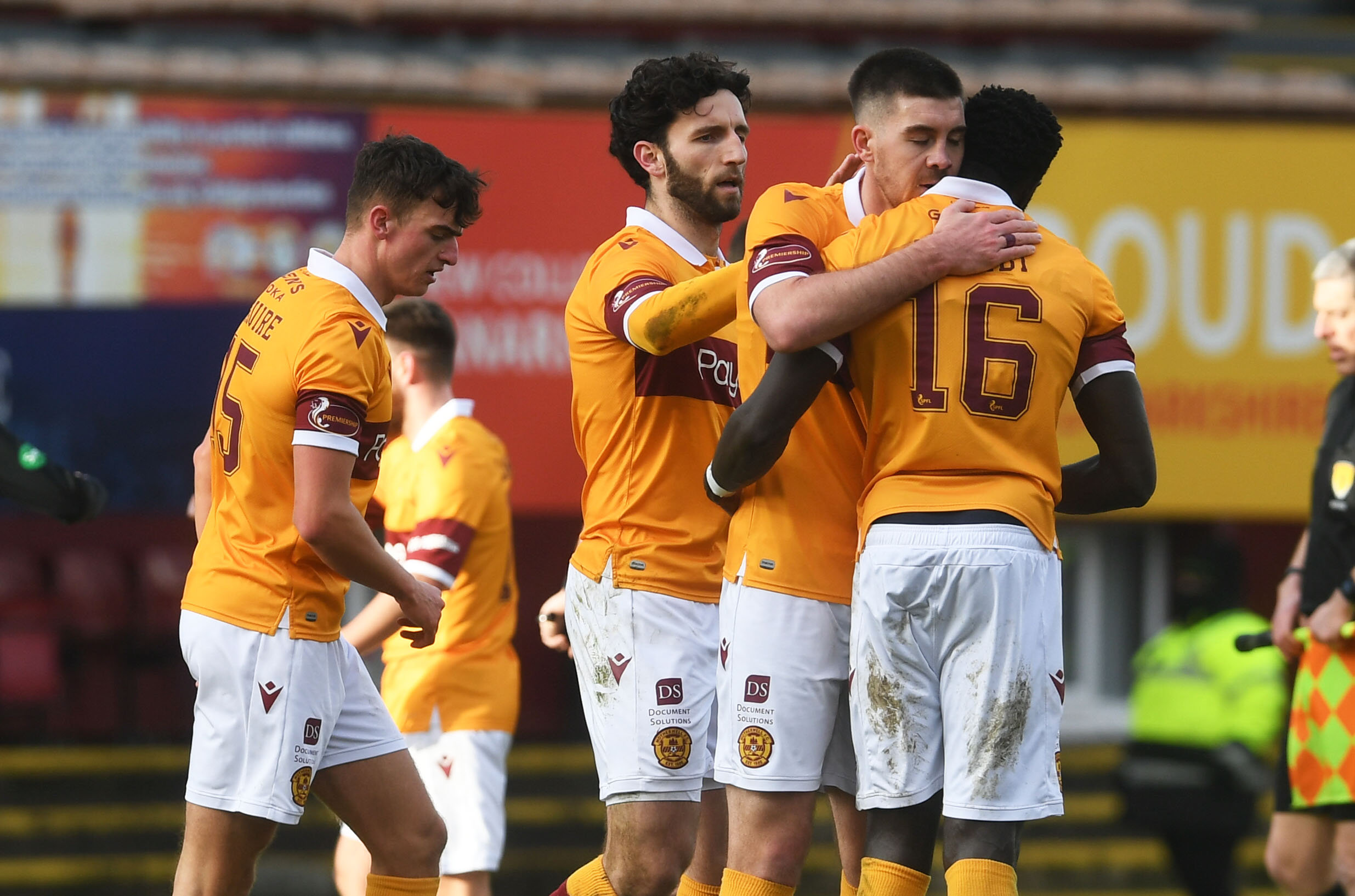 Declan Gallagher congratulates Devante Cole after scoring against Rangers