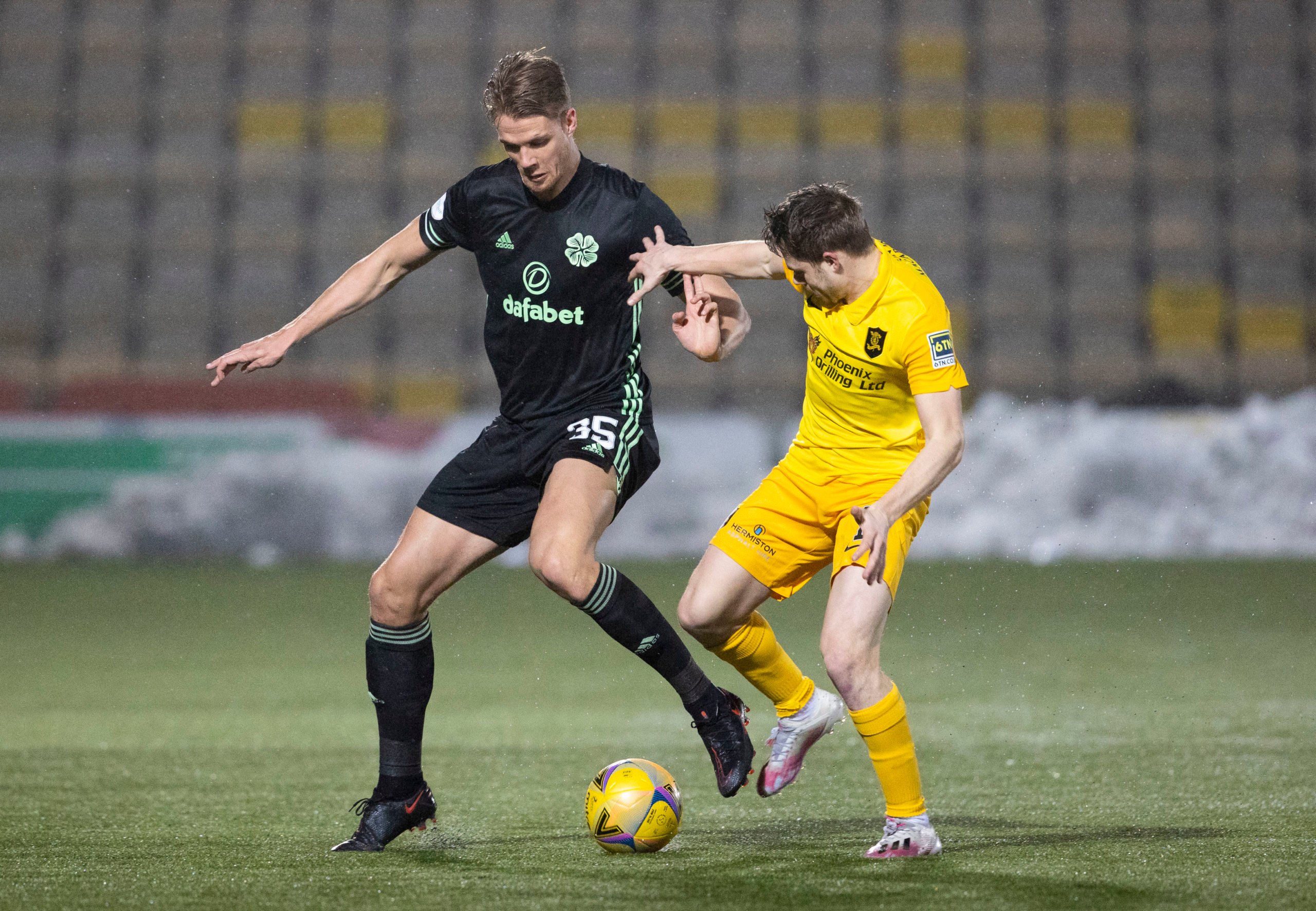 Kristoffer Ajer in action for Celtic against Livingston