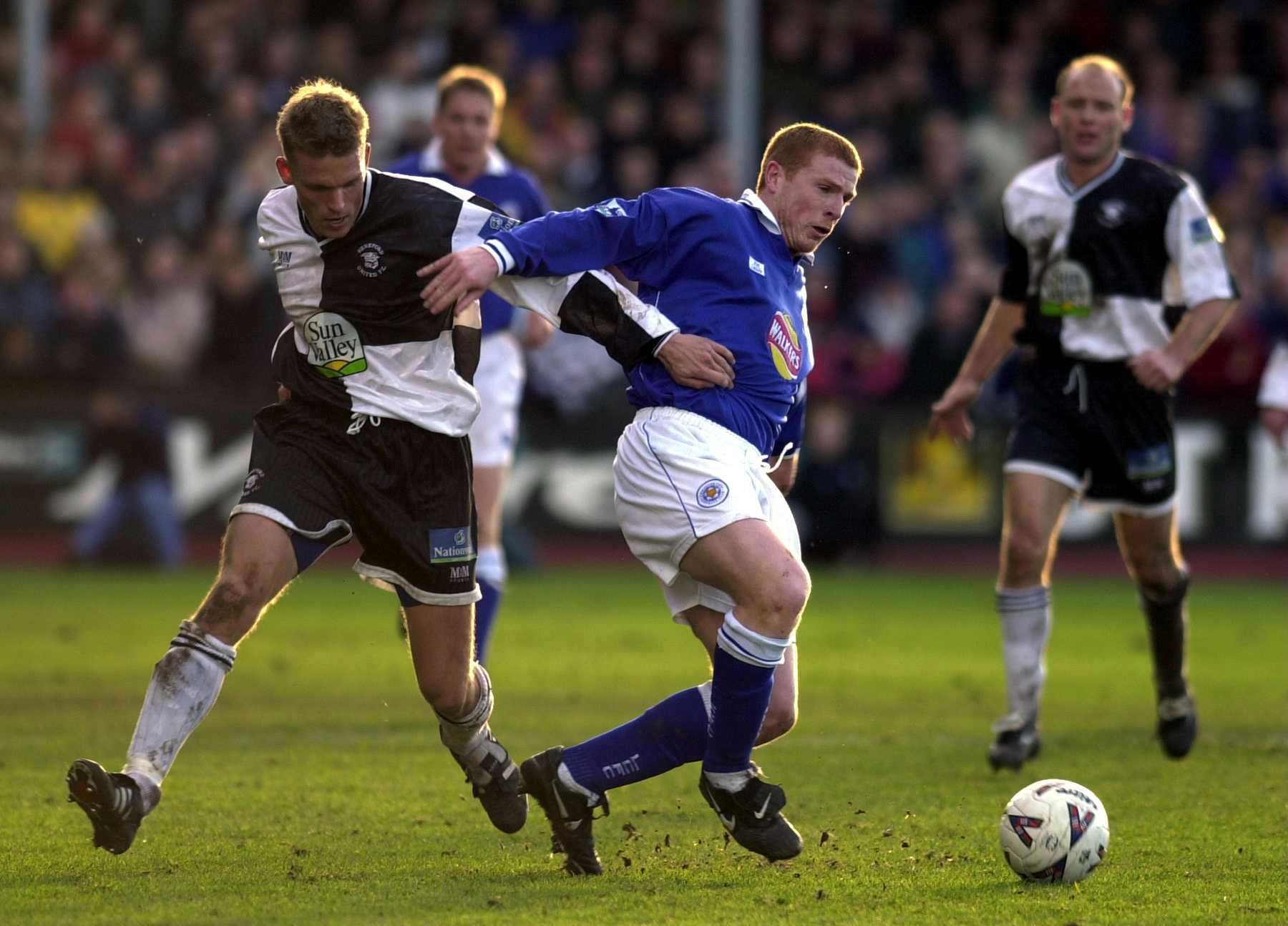 11 Dec 1999: Paul Fewings of Hereford challenged by Neil Lennon of Leicester during the match between Hereford United and Leicester City in the FA...