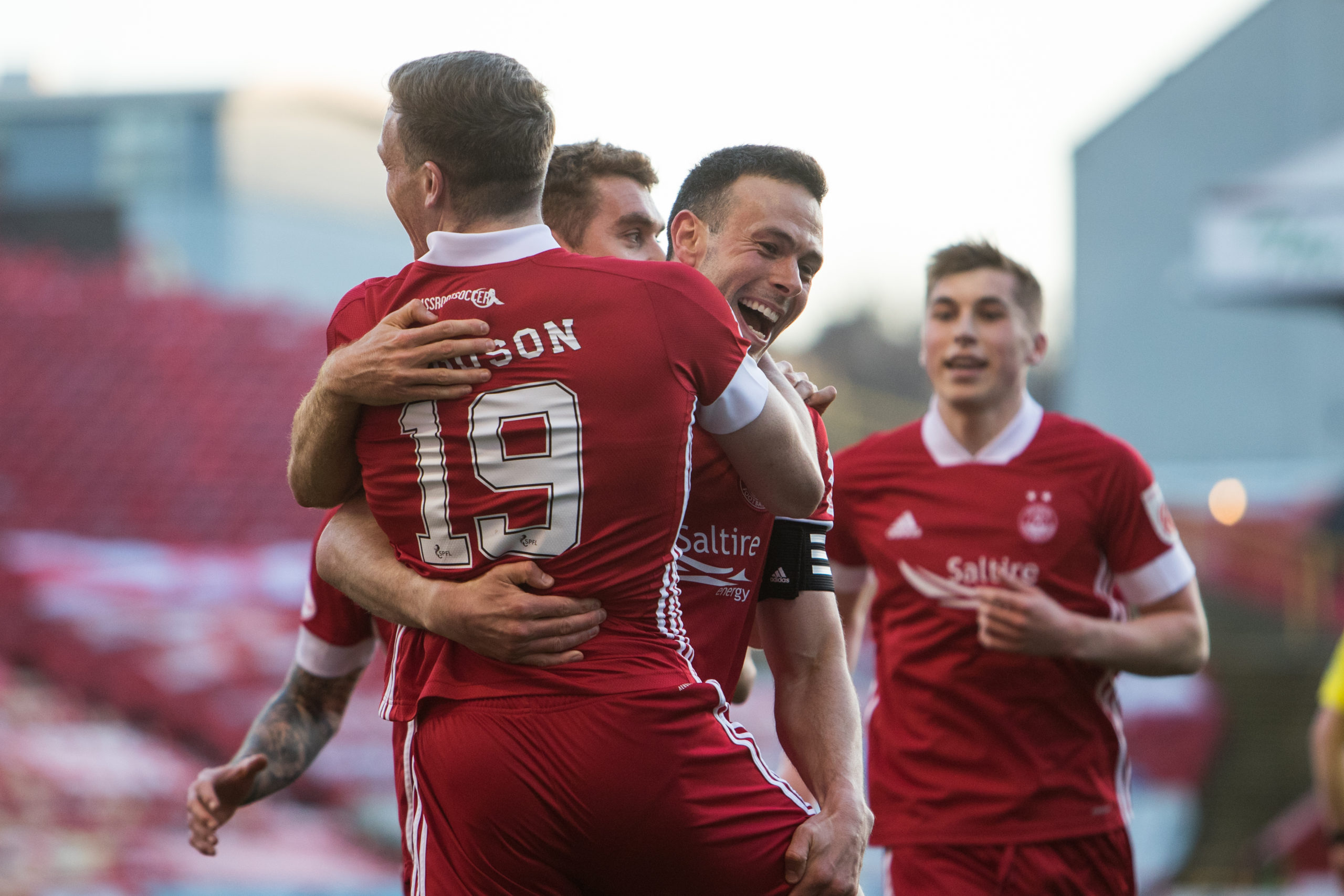 Lewis Ferguson celebrates scoring against Celtic