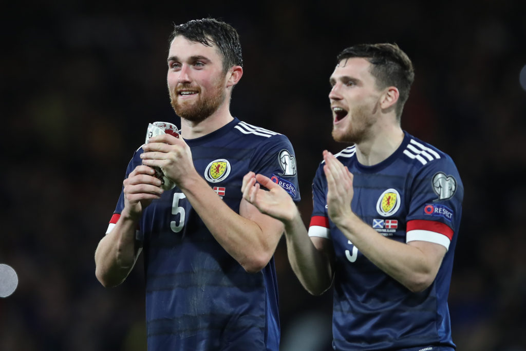 John Souttar celebrates along with Andy Robertson for Scotland