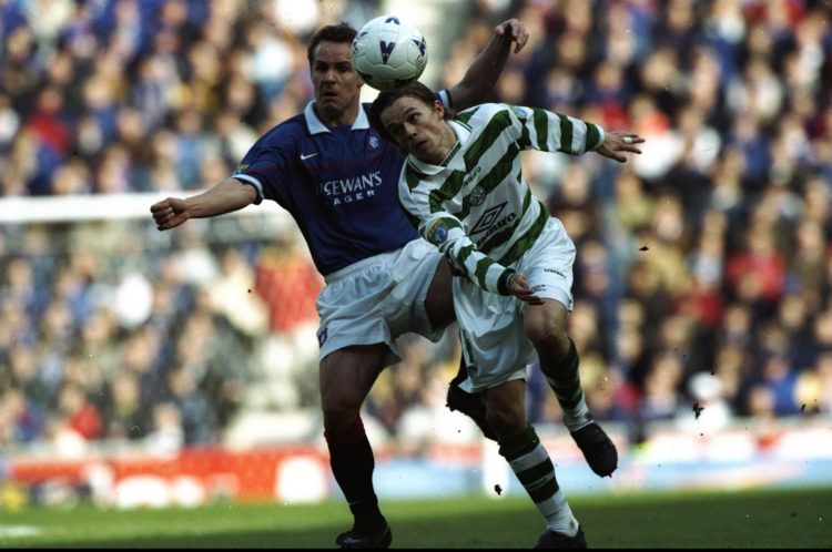 12 Apr 1998:  Simon Donnelly of Celtic takes on Rangers player Jonas Thern during the match between Glasgow Rangers v Celtic in the Bells Scottish ...