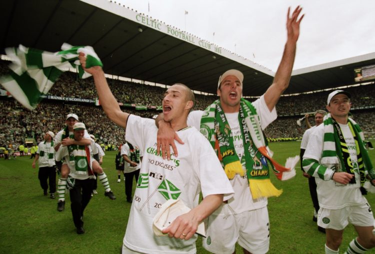 7 Apr 2001:  Celtic players Henrik Larsson (left) and Ramon Vega celebrate winning the League Title after the Scottish Premier League game against ...