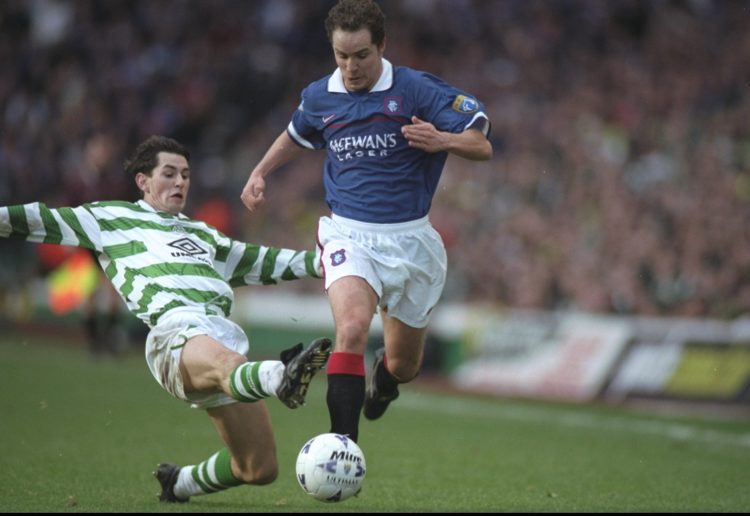 2 Jan 1998:  Alex Clelland of Rangers avoids the challenge of Jackie McNamara of Celtic during the Scottish FA Premier Leauge match at Celtic Park ...
