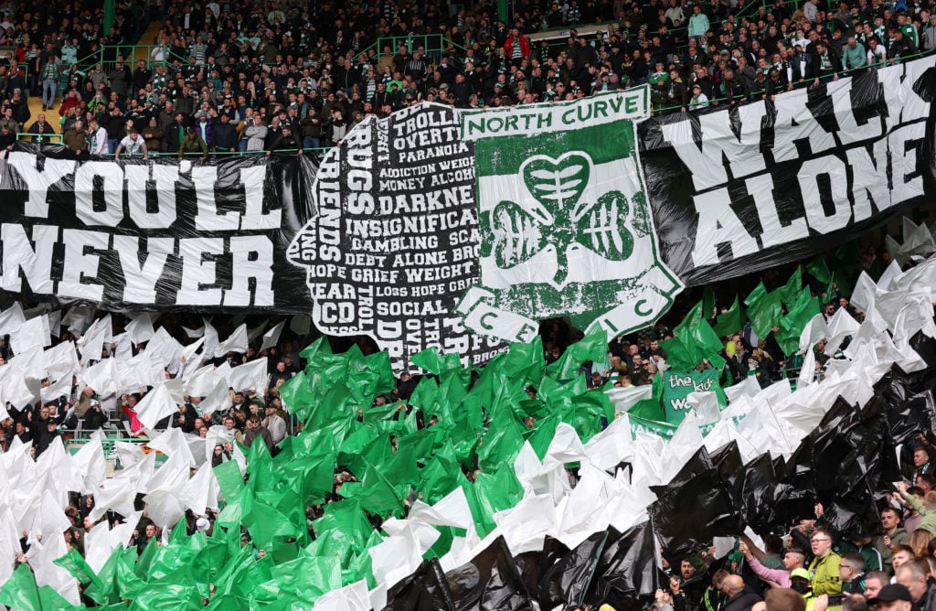 Celtic supporters reveal banners and flags ahead of kick off during the Cinch Scottish Premiership match between Celtic FC and St. Johnstone FC at ...