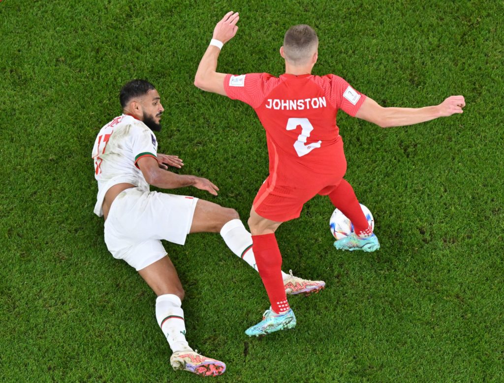 TOPSHOT-FBL-WC-2022-MATCH42-CAN-MAR
