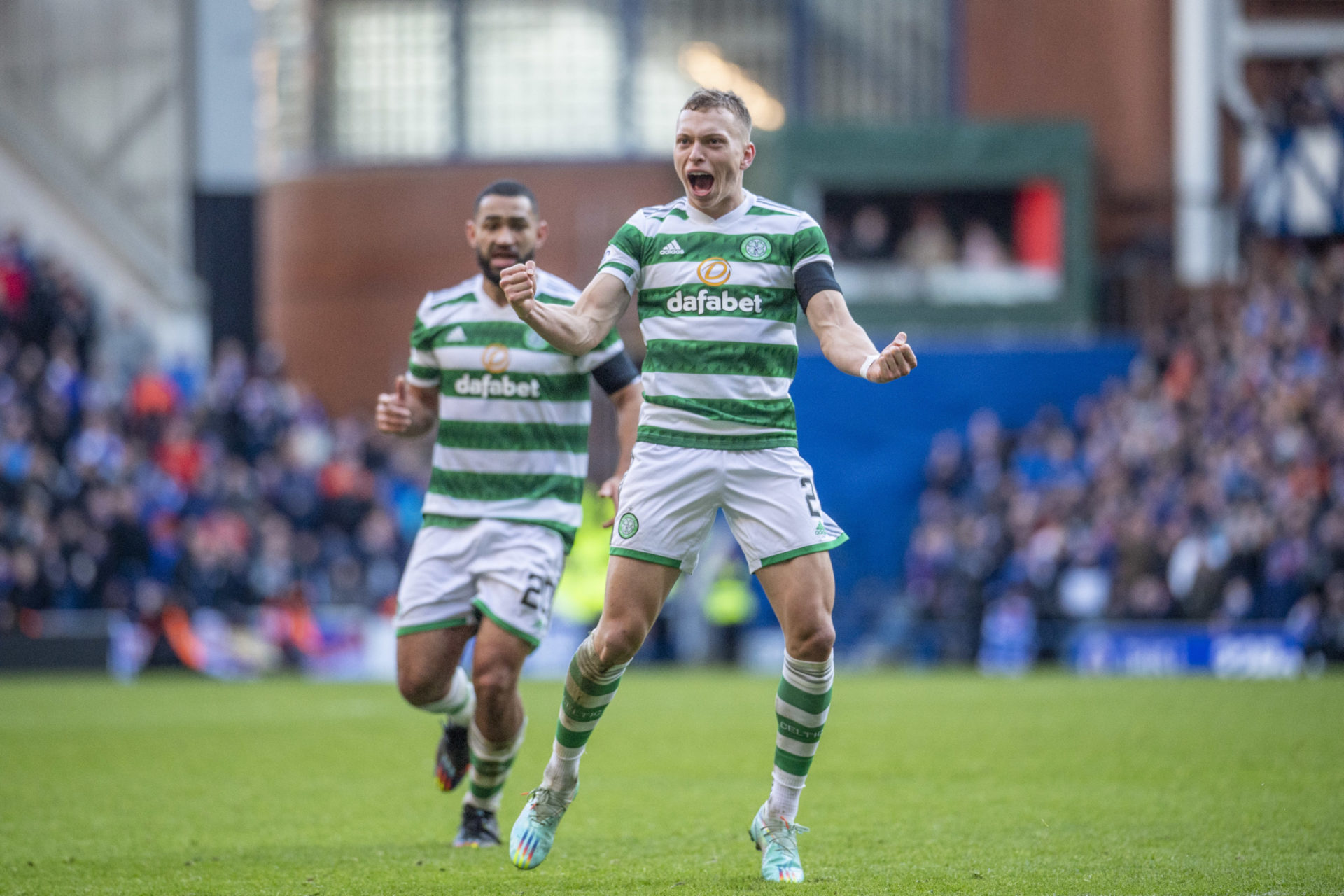 Alistair Johnston celebrates at Ibrox