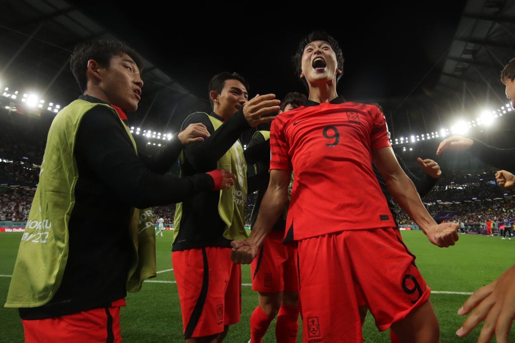 Cho Gue-sung celebrates a goal in Qatar