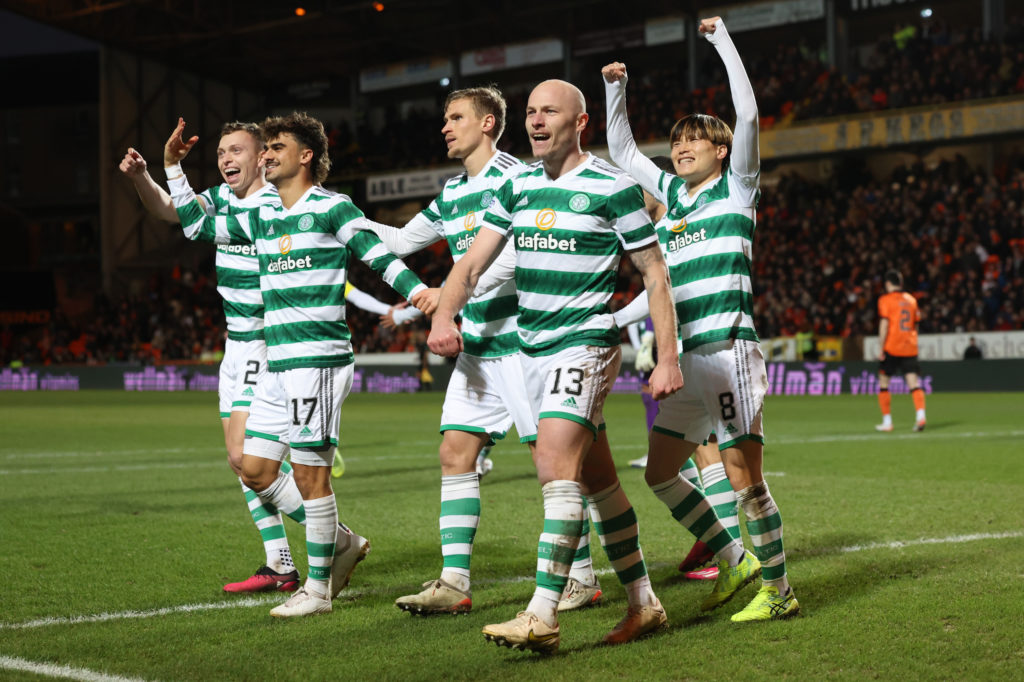 Celtic players celebrate a recent goal at Tannadice