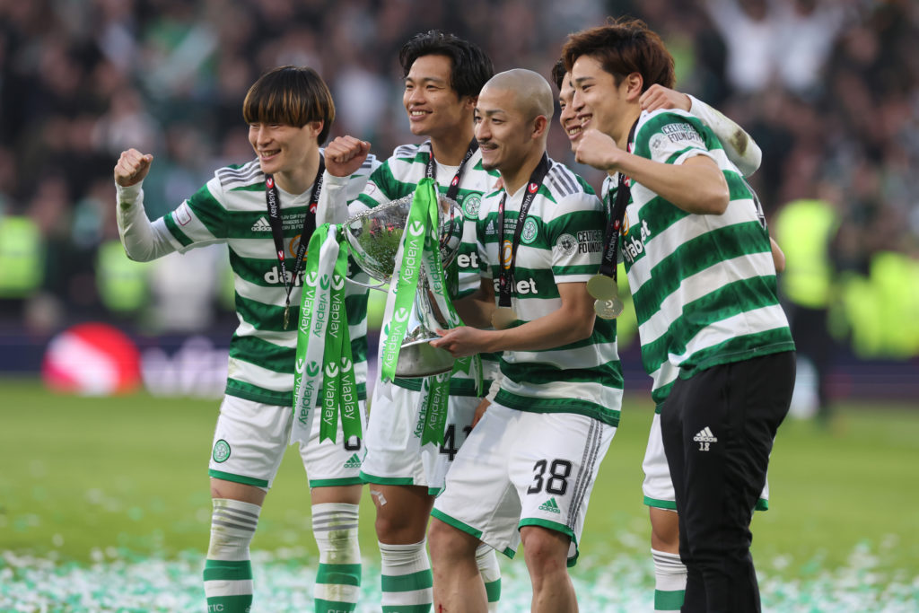 Celtic's Japanese stars celebrate the win at Hampden