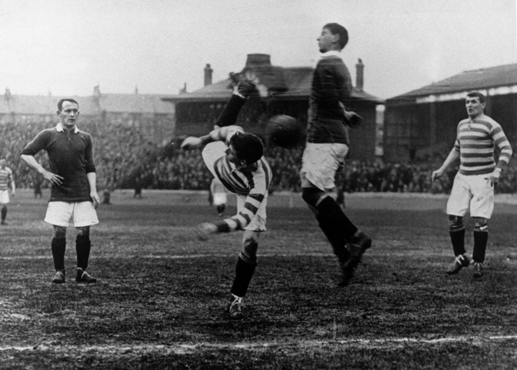 Patsy Gallacher in action for Celtic against Heart of Midlothian. Circa 1911