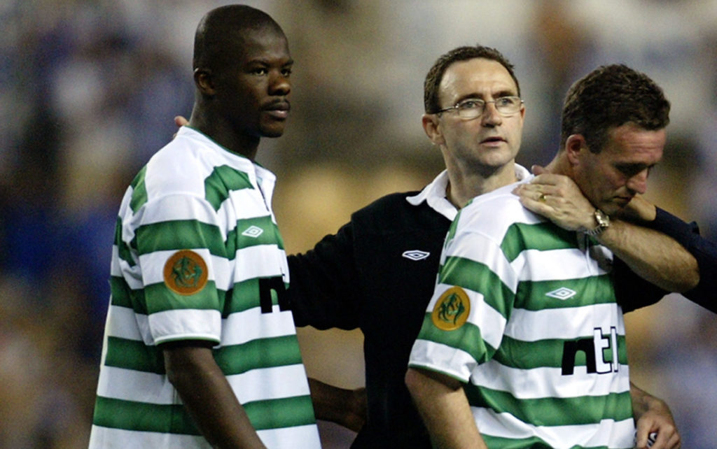 A dejected Dianbobo Balde, manager Martin O'Neill and Paul Lambert all of Celtic