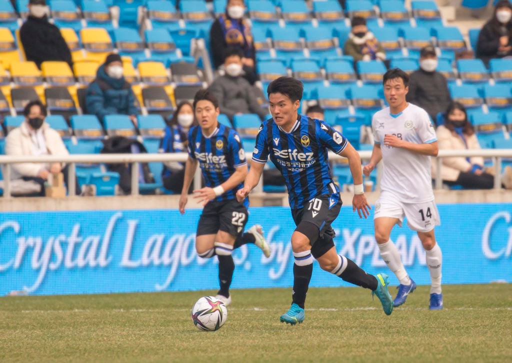 Goo Boon-Cheul (C) of Incheon United FC in action during the