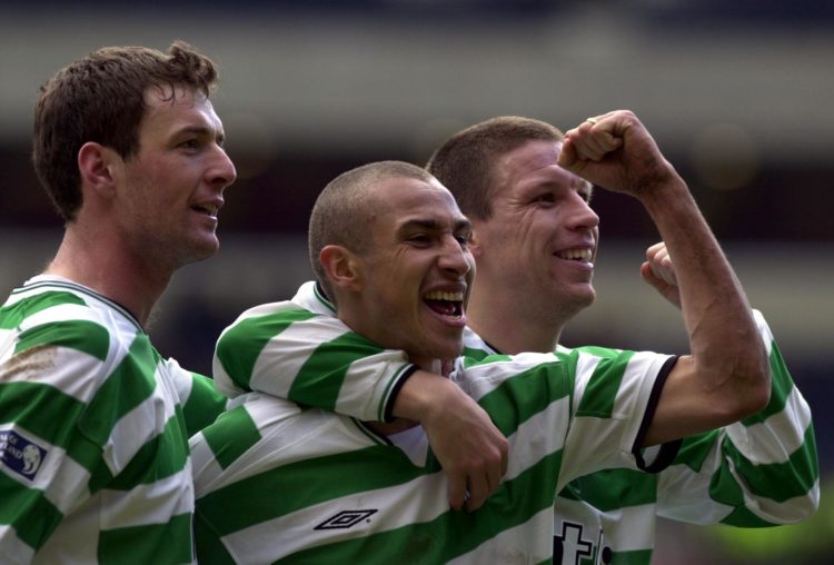 15 Apr 2001: Henrik Larsson of Celtic (centre) celebrates with team mates Alan Thompson (right) and Chris Sutton after giving Celtic a two-nil lead...