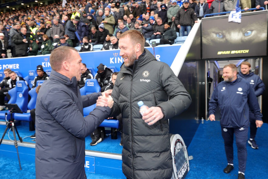 Graham Potter shaking hands with Brendan Rodgers.