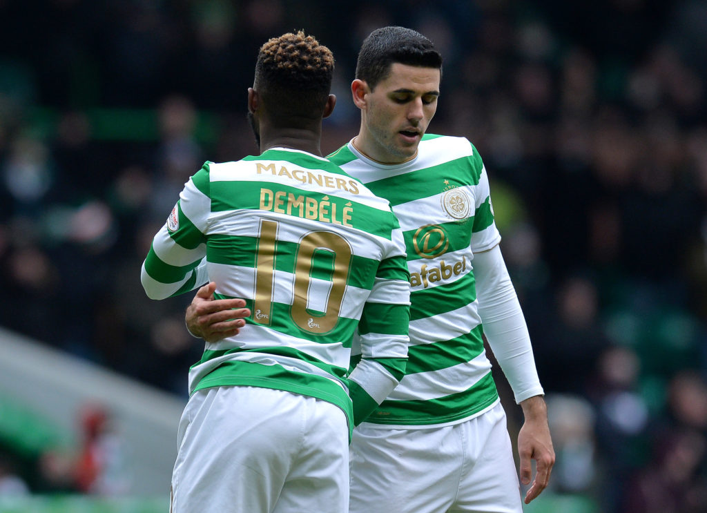 Moussa Dembele of Celtic celebrates scoring his first goal of the game with his teammate Tom Rogic during the Scottish Cup Quarter Final match between Celtic and Greenock Morton at Celtic Park